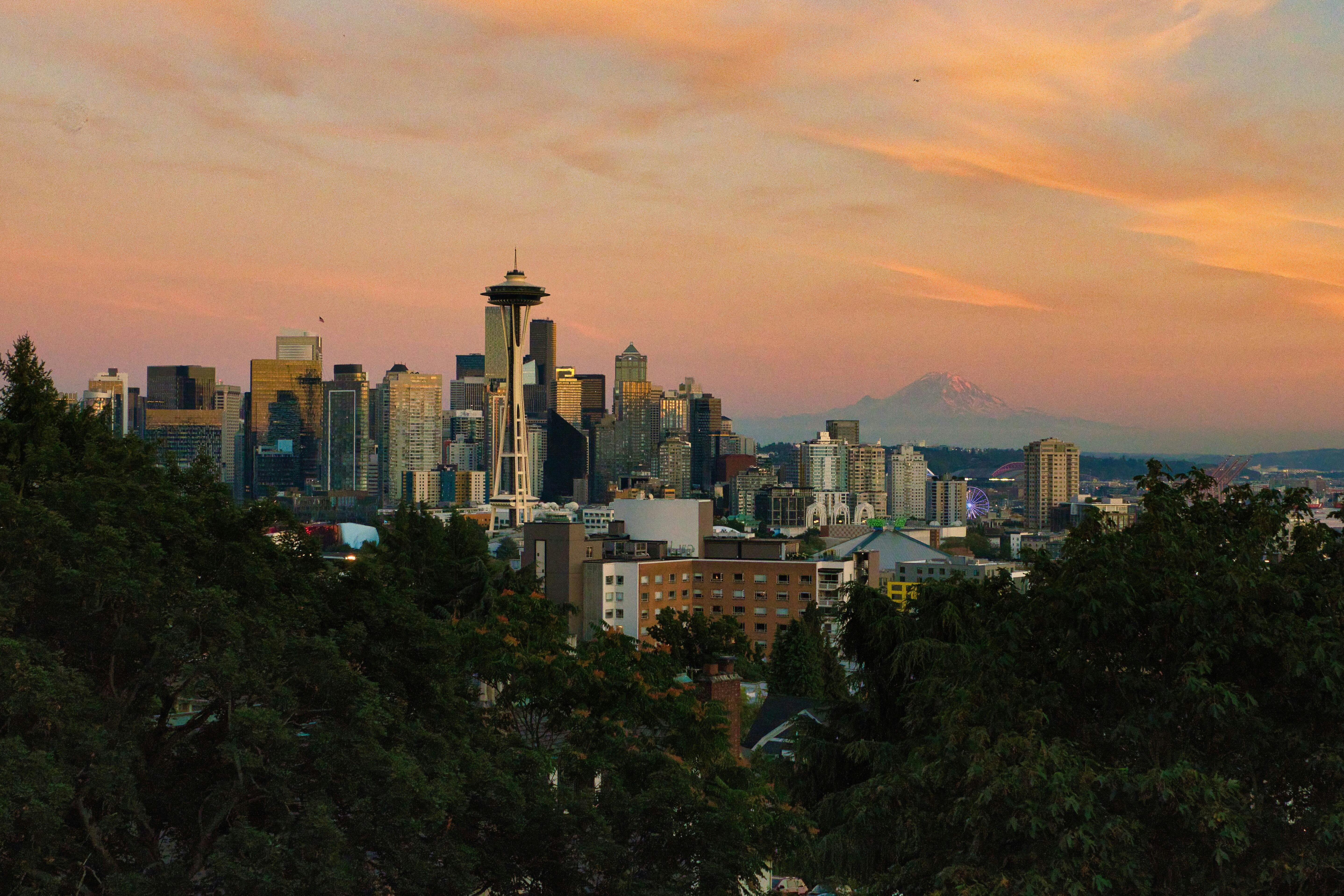 Seattle skyline at sunset with Space Needle and Mount Rainier